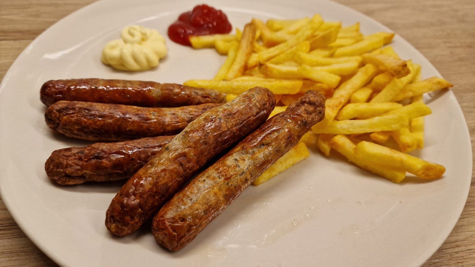 Air fryer bratwurst with French fries