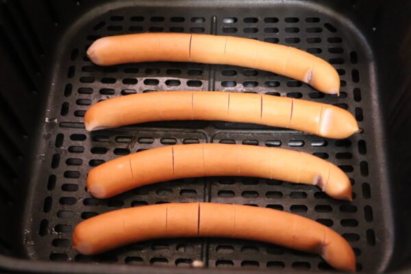 Baking sausages in an airfryer before baking