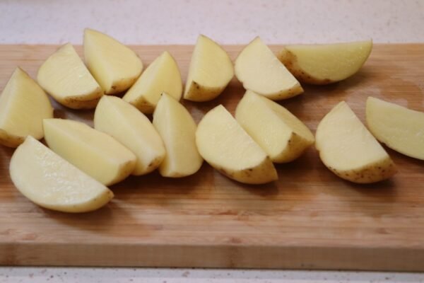 Preparing air fryer baked potatoes 1
