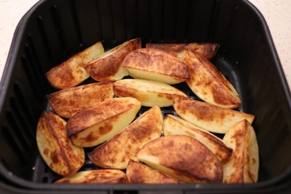 Preparing air fryer baked potatoes 3