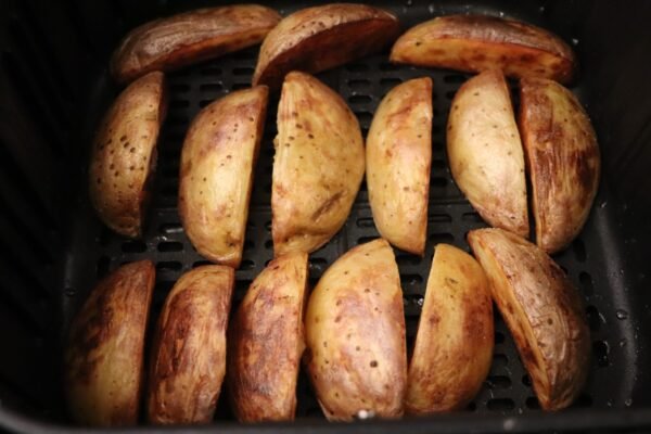 Preparing air fryer baked potatoes 4